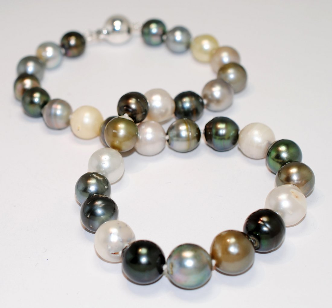 Tahitian South Sea Cultured Pearls w/ GLA Certification: Please review the attached gemologist report for further relevant information.