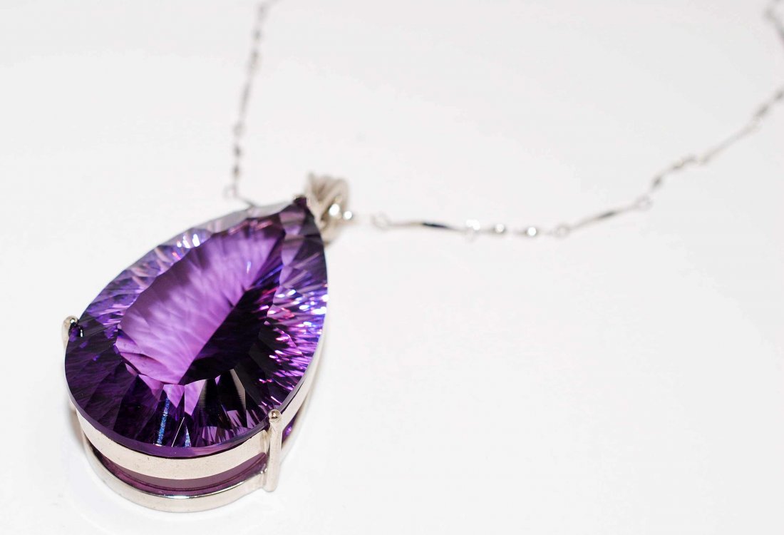 70ct+ Natural High Quality Amethyst .925 Silver Pendant: 70ct+ Natural High Quality Amethyst set in .925 Sterling Silver Pendant with Sterling Chain.