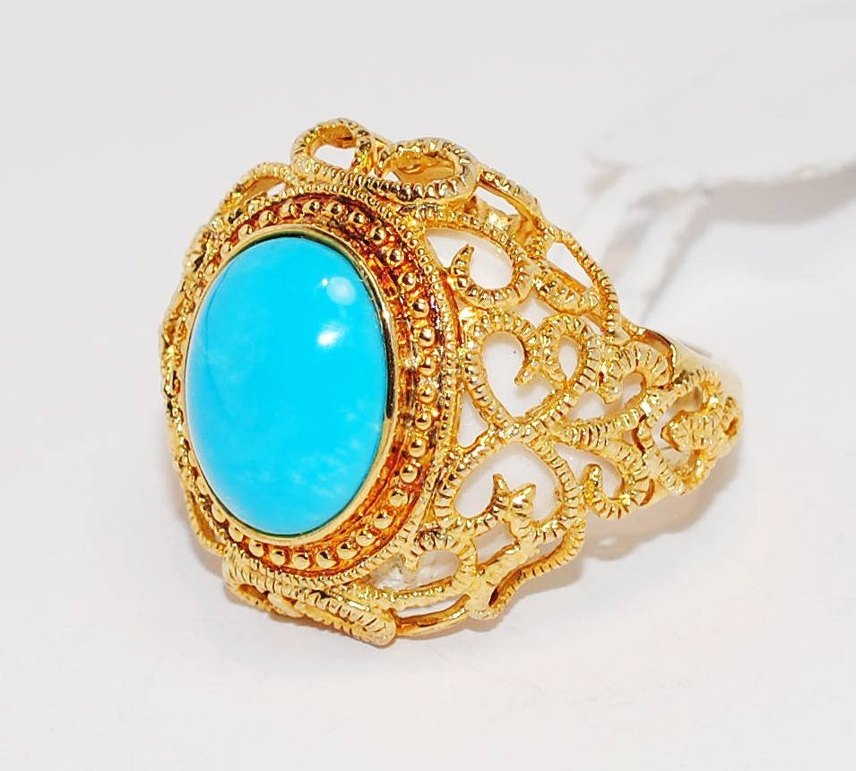 3.49ct Turquoise & White Chalcedony 14KT Gold Ring: Please review the attached gemologist report for further relevant information.
