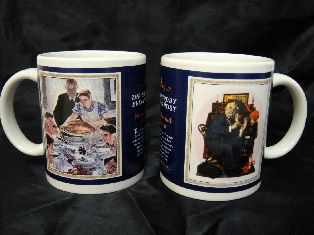 Set of 2 Norman Rockwell Collection Mugs: PAIR OF NORMAN ROCKWELL COLLECTION MUGS ONE WITH "FREEDOM FROM WANT FROM STORY ILLUSTRATION MARCH 6, 1943" AND ANOTHER WITH "DR. & DOLL FROM COVER MARCH 09, 1929" OF THE SATURDAY EVENING POST.