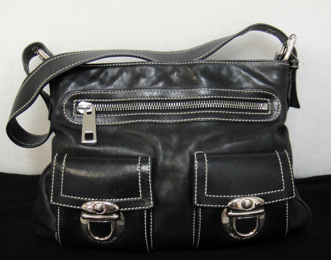 Genuine Marc Jacobs Black leather handbag with p: 100% Authentic Marc Jacobs Black leather handbag with pockets. Made in Italy.