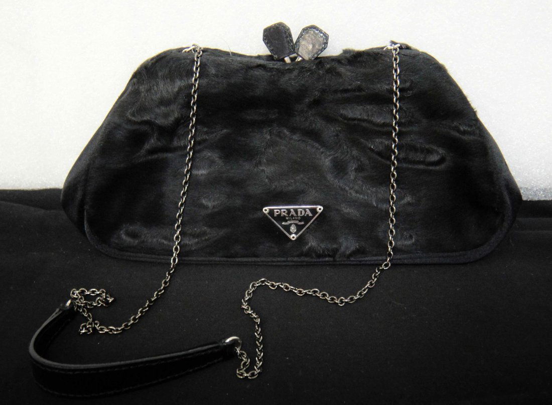 Authentic Prada Milano Black Pony Evening Bag: 100% Genuine Prada Milano Back Phone Evening bag. Made in Italy- Comes with a small Prada mirror.