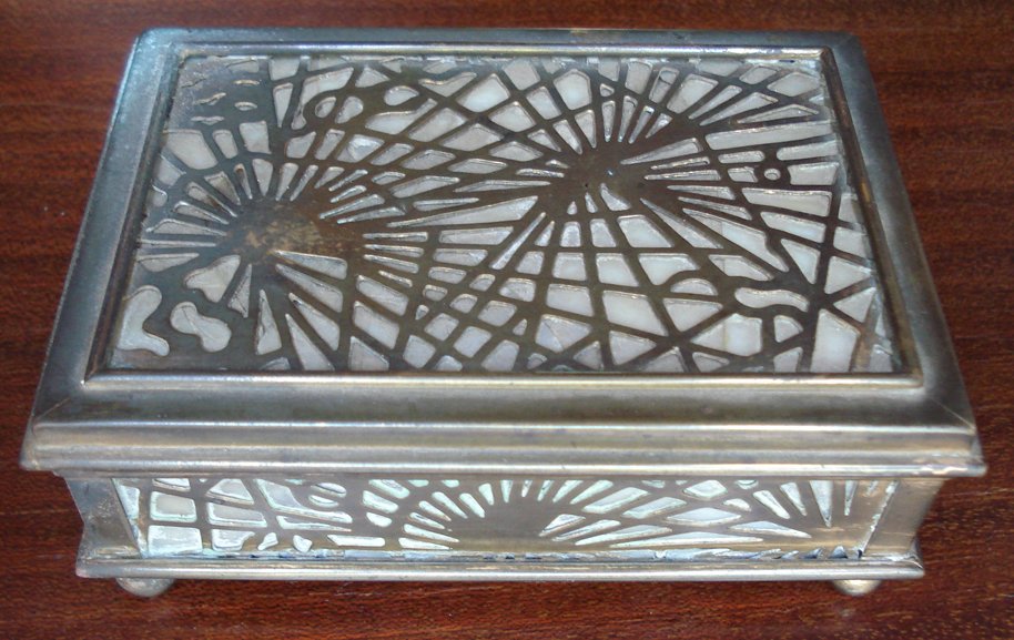 TIFFANY STUDIOS PINE NEEDLE BRONZE ART GLASS DESKT: Original Tiffany Studios Desk Top/Utility Box in Bronze and Slag Glass. The piece is in the Pine Needle design. There is some wear to the item. Three off the glass panes have cracks but have been trea