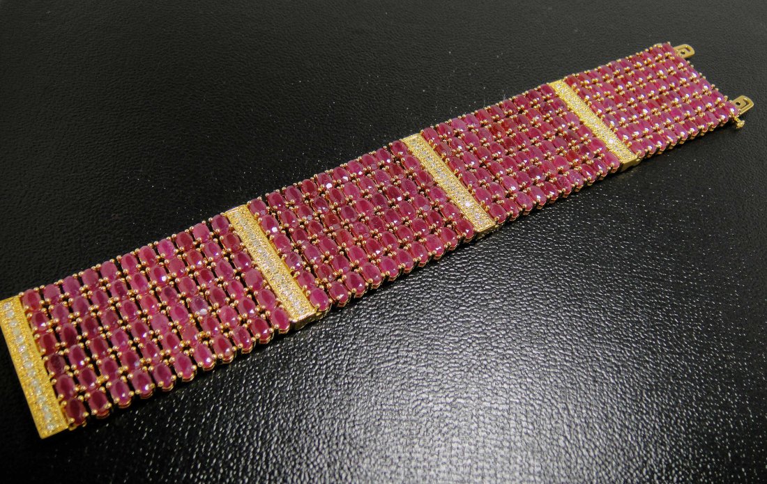85.01ctw Ruby & 0.95ct Diam 14KT Plate Sterling Bracele: Please review the attached gemologist report for further relevant information.