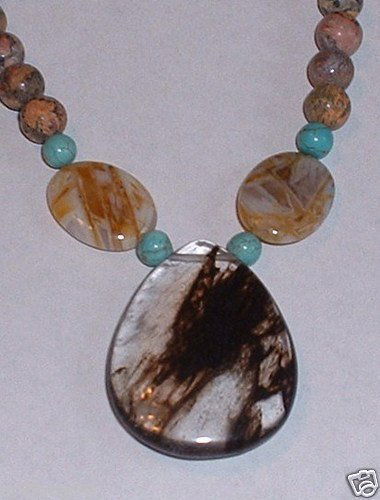 RUTILATE QUARTZ, BAMBOO AGATE, LEOPARD JASPER NECK: RUTILATE QUARTZ, BAMBOO AGATE, LEOPARD JASPER NECKLACE HANDMADE BY PAUL 20" INCH NECKLACE TOTAL WEIGHT 52.0 GRAMS MAIN PENDANT RUTILATE QUARTZ 1 1/2 INCH X 1 1/4 INCH 25 NATURAL LEOPARD JASPER . 2 NAT