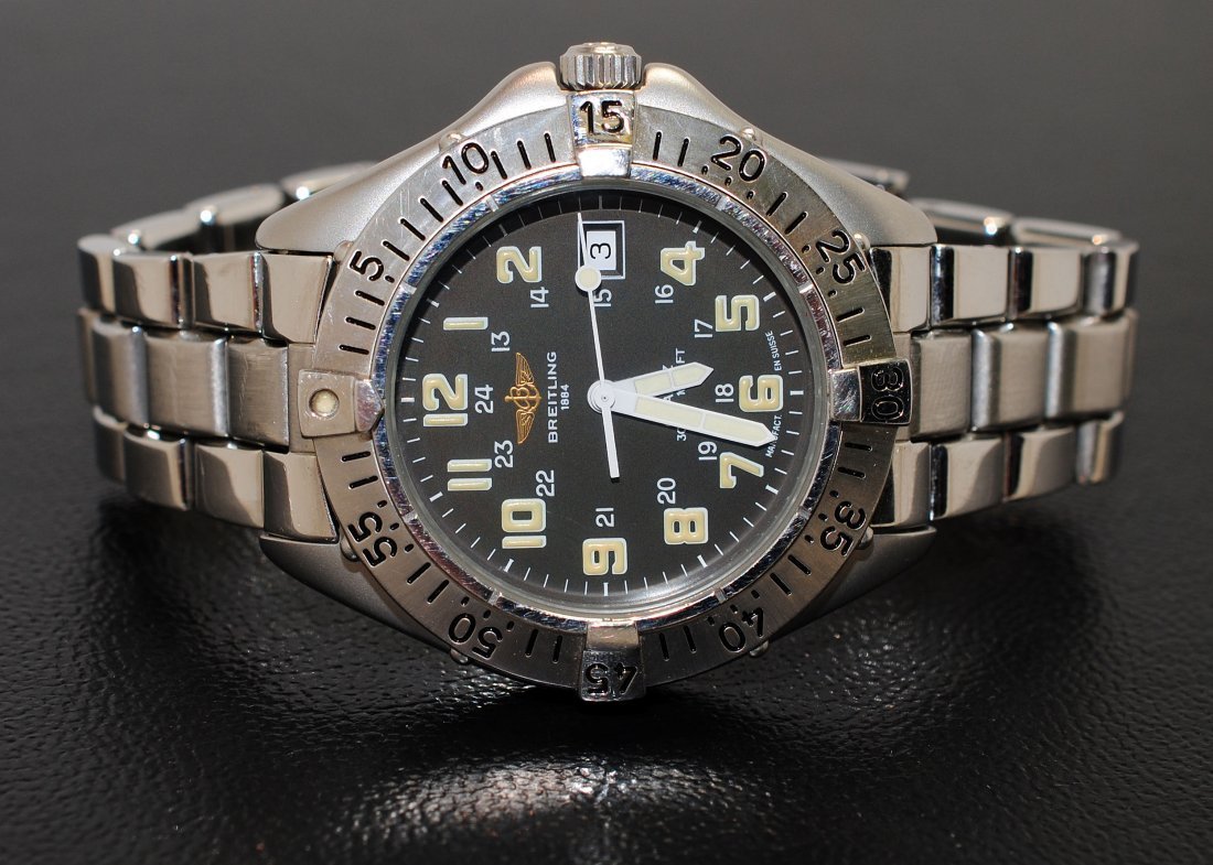 Breitling Aeromarine Colt Stainless Steel Wristwa: Please review the attached gemologist report for further relevant information