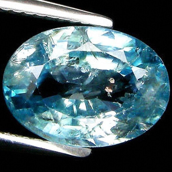 4.89ct Oval Cut Light Blue Paraiba Zircon: Please review the attached gemologist report for further relevant information.