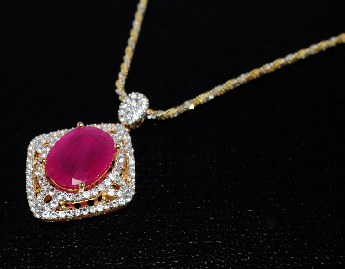 11.84ct Ruby & 2.31ct CL Sapphire 14KT Sterling Pend: Please review the attached gemologist report for further relevant information.