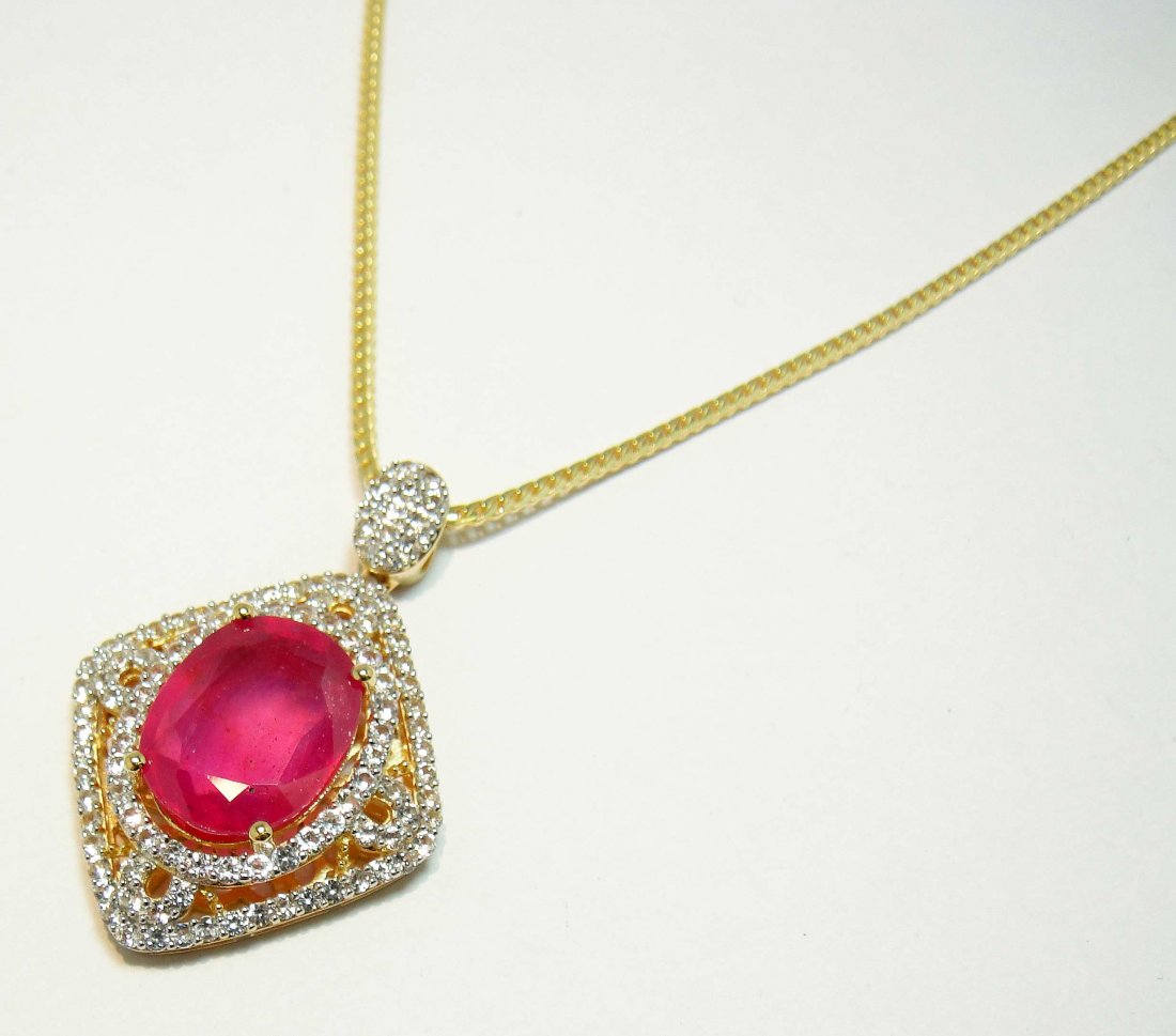 14.16ct Ruby & CL Sapphire 14KT Plated Sterling Pendant: Please review the attached gemologist report for further relevant information.