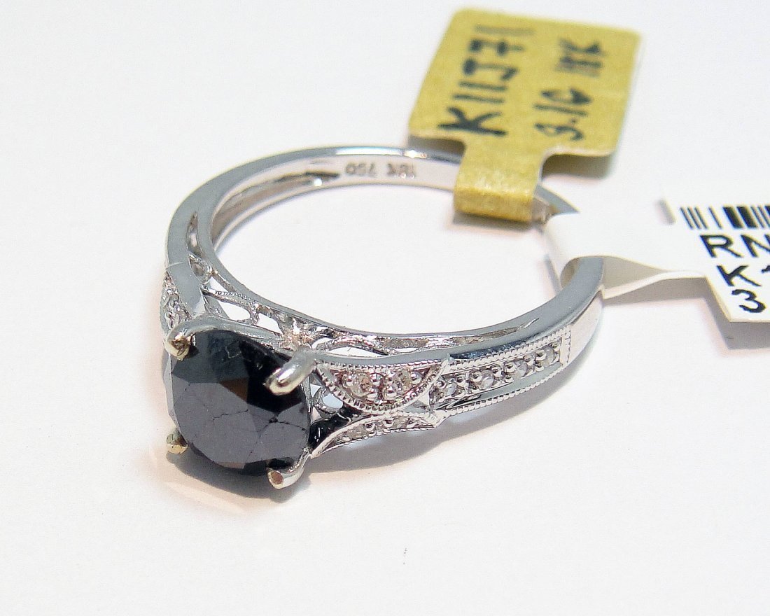 1.60ctw Black & White Diamond 18KT White Gold Ring: Please review the attached gemologist report for further relevant..