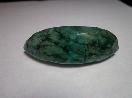 145.85 carats Emeral "Beryl" Gemstone: Please review the attached gemologist report for further relevant information w301