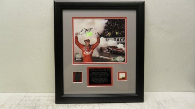 Dale Earnhardt Jr. Autographed & Race Used Photo: This auction will include the Dale Earnhardt Jr. Autographed & Race Used Mounted Memories Photo Shadow Box LE #51/108 as shown in pictures. The overall size of this Shadowbox is 15" Wide x 17" Tall x 