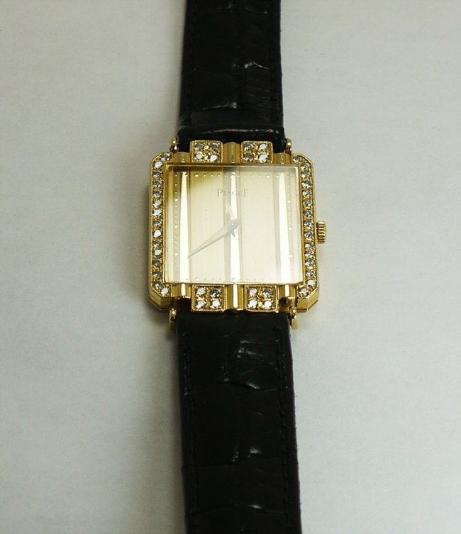GENTS PIAGET DIAMOND WRISTWATCH: Please review the attached gemologist report for further relevant information K76J99