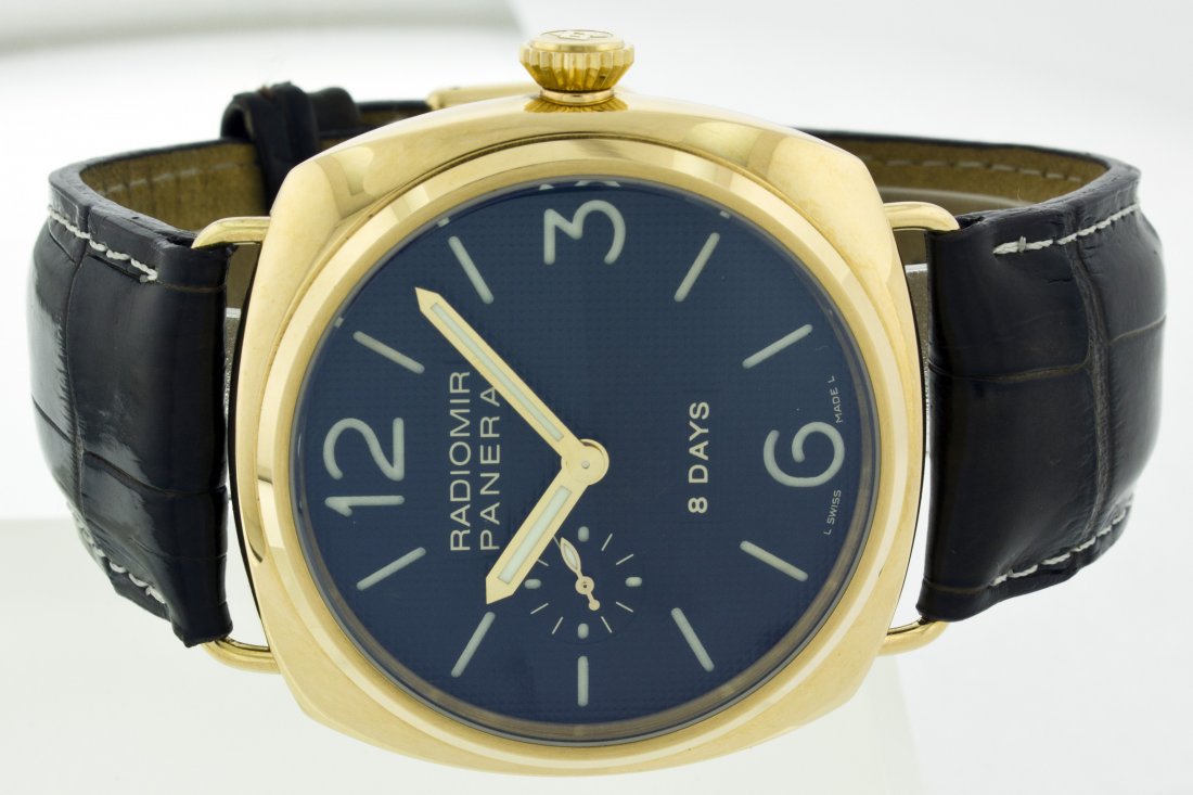 PANERAI RADIOMIR 18K PINK GOLD WITH LEATHER BAND: PANERAI RADIOMIR 2002 18K PINK GOLD WITH LEATHER BAND 18K Rose Gold case with genuine crocodile leather band. 18K Rose Gold tang buckle. Black sandwich dial with index hour markers and up to 50 meter 