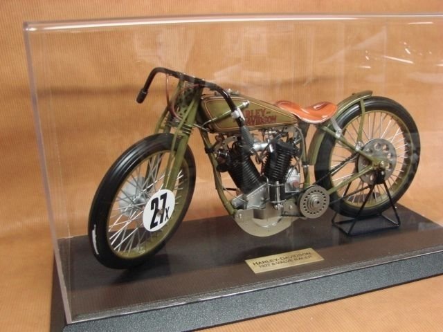 Harley Davidson 1927 8-Valve Racer W708: Harley Davidson 1927 8-Valve Racer. Motorcycle Size: 13.25" overall length x 6" tall. The custom display case is made of plexiglass with a wood base. It measures 15 1/2 at the base x 14" tall; the bas