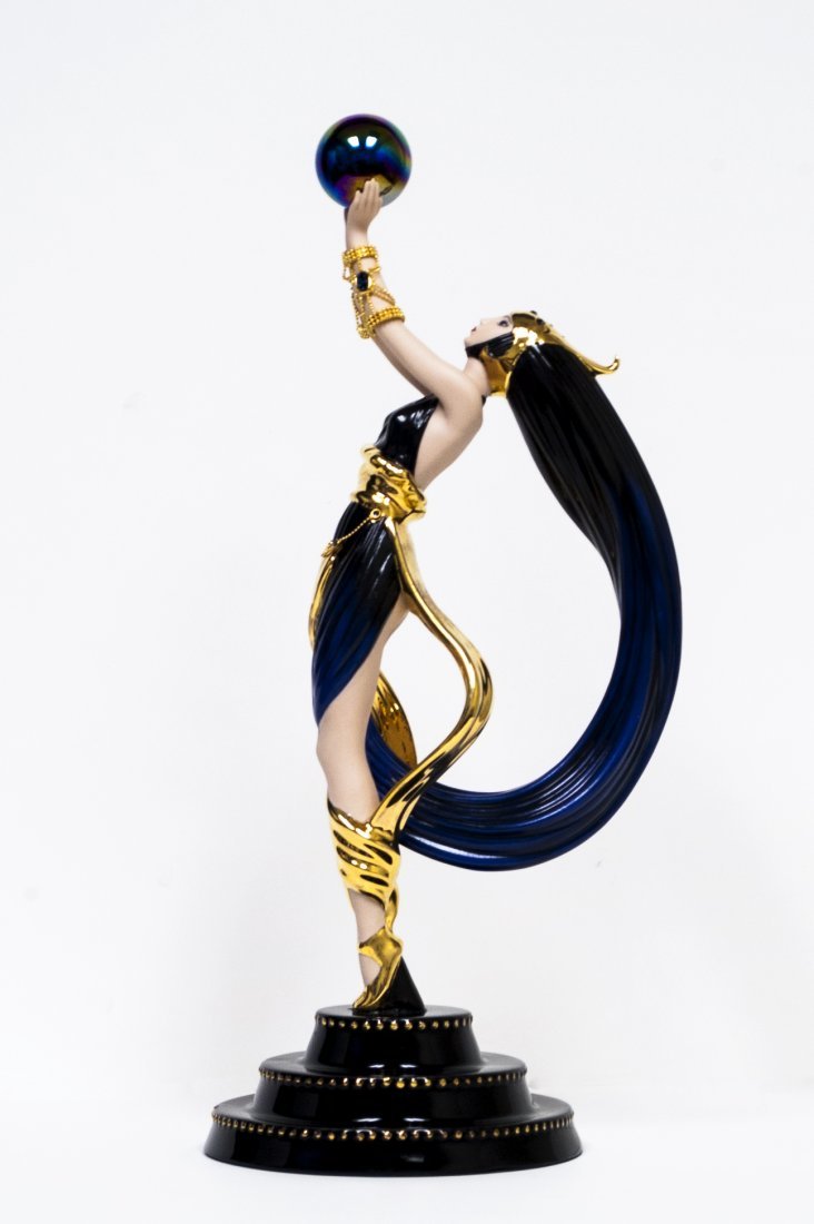 The Globe from the House of Erte W162: The Globe from the House of Erte fine porcelain and hand painted Size: 12.5" tall comes with COA W162