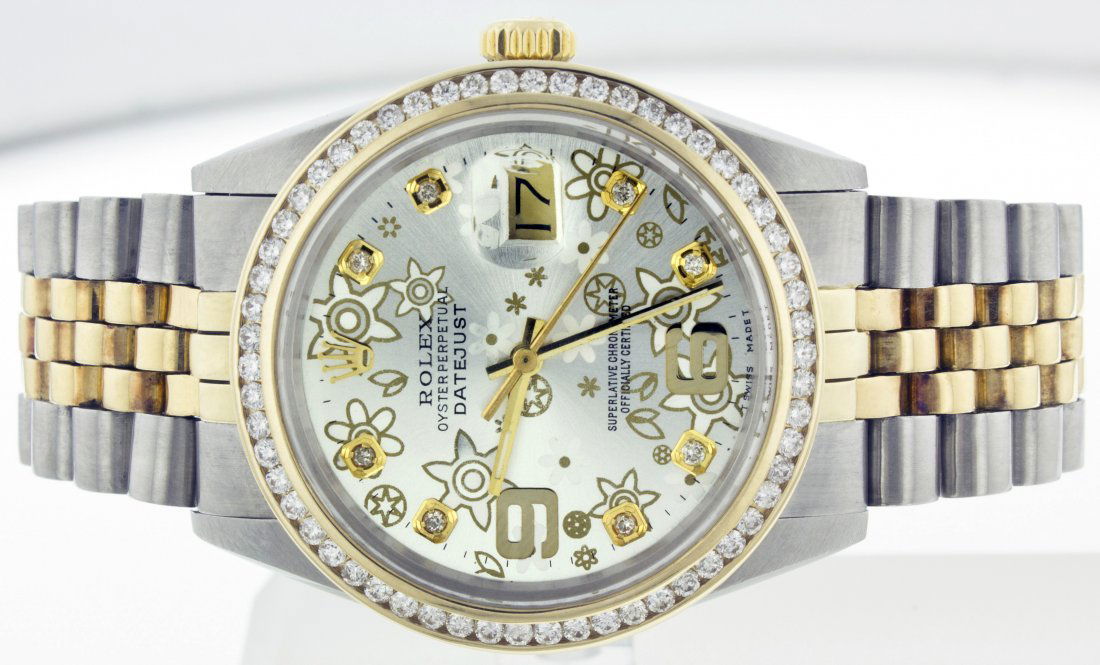 Rolex StainlessSteel&YellowGold Datejust WA13053: Rolex Stainless Steel and Yellow Gold Datejust 36mm (1980s) 16013. Custom Yellow Gold Bezel set with Round Diamonds in Channel Setting. Custom Silver Floral Dial with Diamond Hour Markers. Rolex Stain