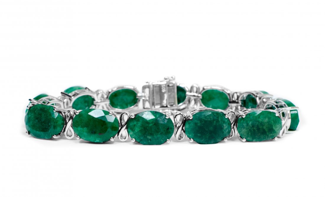 53.65cts Green Beryl Silver Bracelet K31J3: Please review the attached gemologist report for further relevant information. K31J3