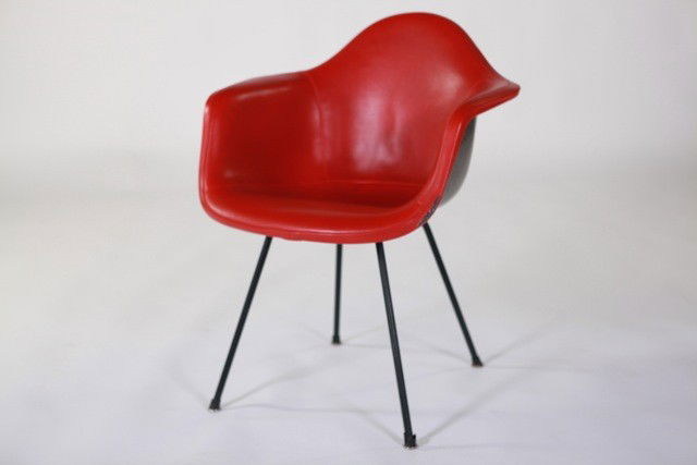 Charles Eames - Arm Chair: Designer: Charles Eames Item: Arm Chair Mfg.: Herman Miler Description: Molded Fiberglass back w/ removable full vinyl cover Unit: 1 Dim. Exactly: (L x W x H"): 24x23x31 Circa: 1950