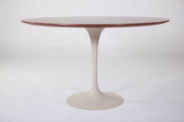 Eero Saarinen - Dining Table: Designer: Eero Saarinen Item: Dining Table Mfg.: Knoll Description: Walnut veneer with solid walnut edge Unit: 1 Dim. Exactly: (L x W x H"): 48" dia x 29" h Circa: 1966