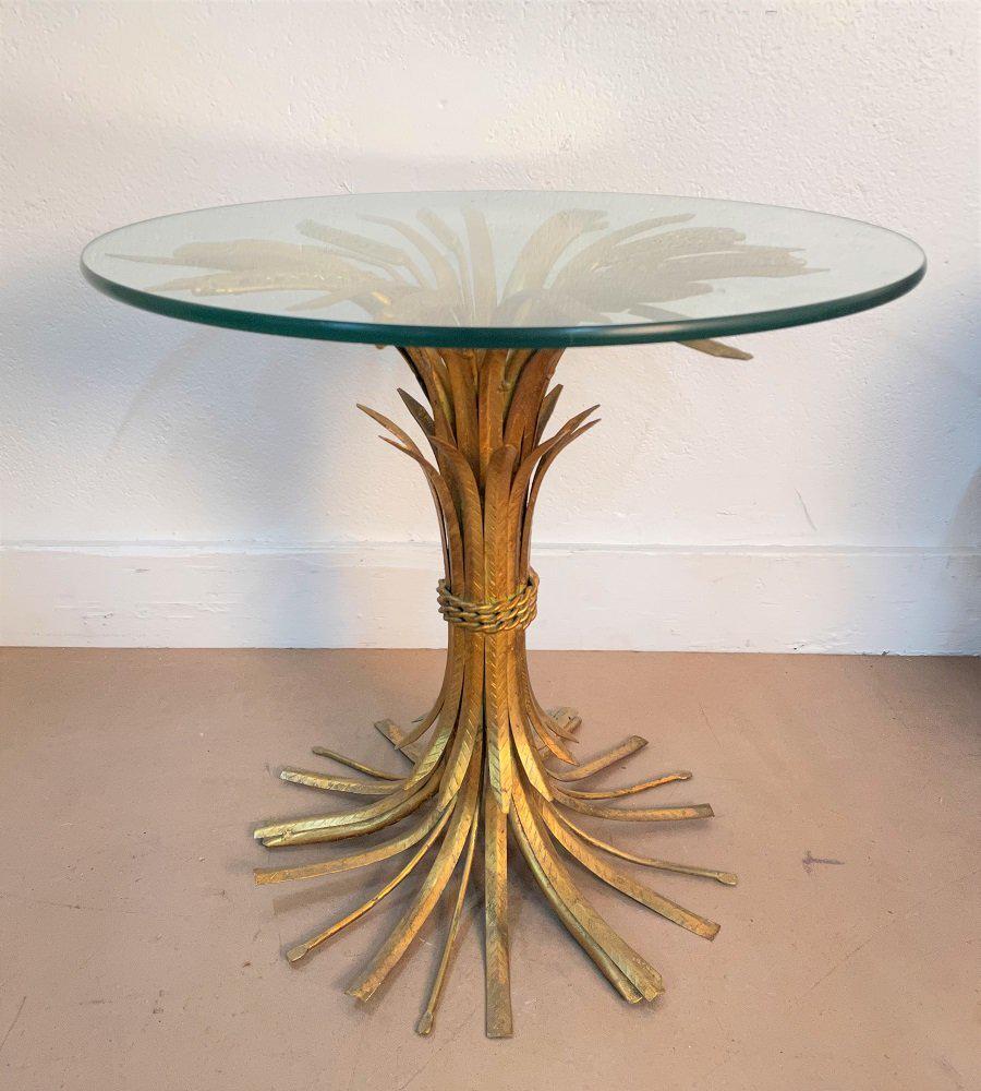 Brass and Glass Sheaf of Wheat Side Table: Brass and Glass Sheaf of Wheat Side Table. Measures: 19.5H x 24 in diameter.