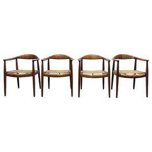 Hans Wegner JH-501 Armchairs for Johannes Hansen Set of 4: Set of four Model JH 501 dining chairs with cane seats, designed by Hans Wegner for Johannes Hansen, Denmark. This design is known as "The Chair". The oak frame has woven cane seats. Marked on undersi