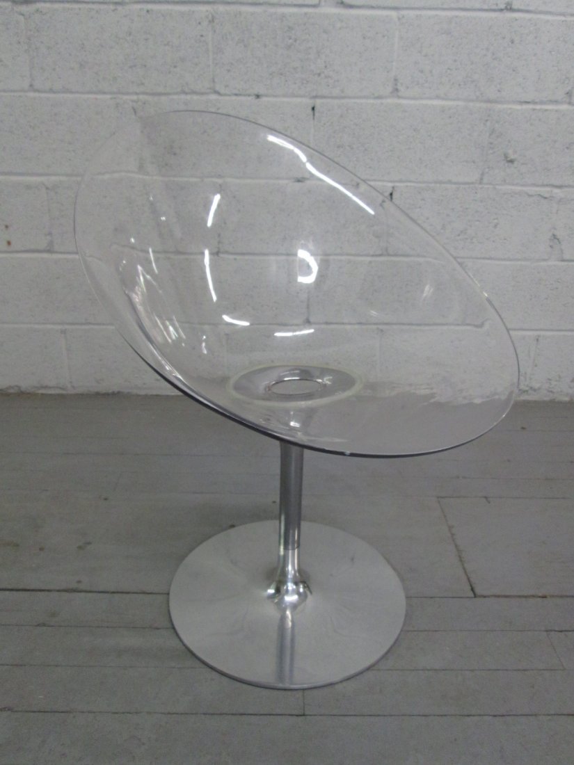 Philippe Starck for Kartell Eros Swivel Chair. Luc: Philippe Starck for Kartell Eros Swivel Chair. Lucite egg shape seat with an aluminum base. Measures: 32"H x 24"D x 24"W