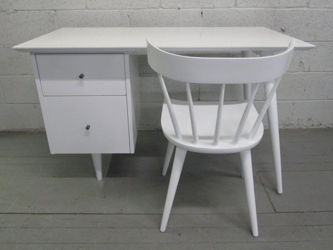 Paul McCobb Desk & Chair from Planner Group: Newly painted over in white. Top of desk is formica. Original handles. Minor scratches and some rough spots. Desk measures: 46.25"W x 24"D x 29.5"H. Chair: 19.5"W x 18"D x 31.5"H.