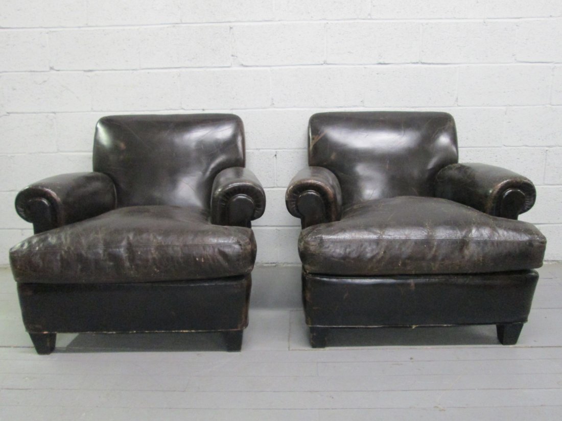 Pair French Style Leather Club Chairs: Dark brown lLeather club chairs with down filled cushioned seats. Measures: 33"D x 36"W x 31"H
