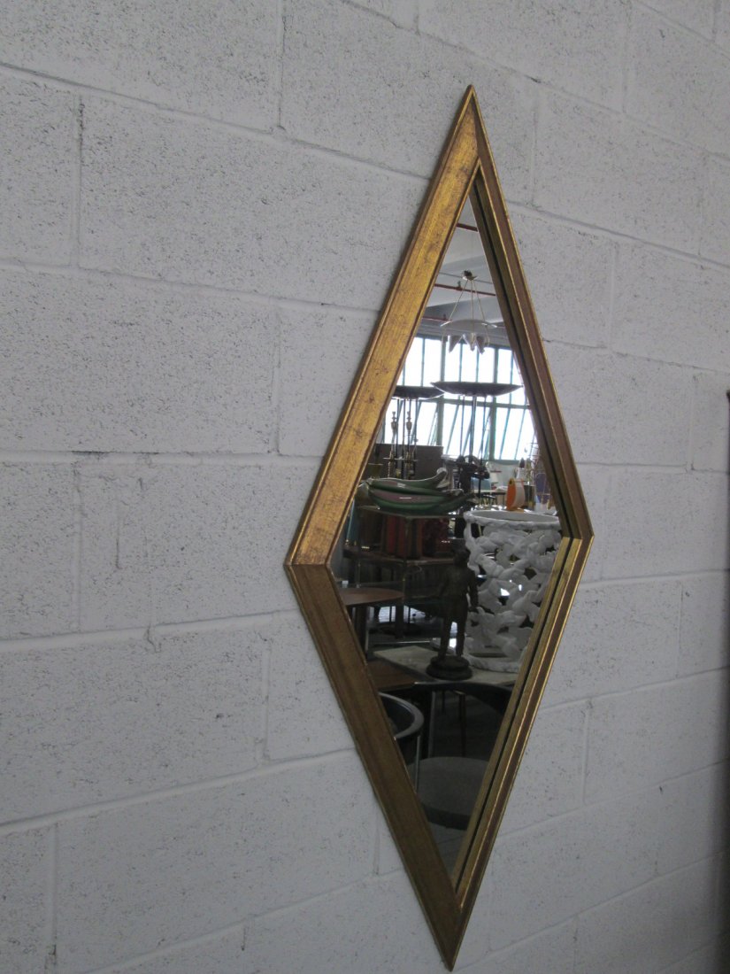 Gold Gilt Diamond Shaped Mirror: White ceramic table lamps. Measures: 31"H (to top of finial)