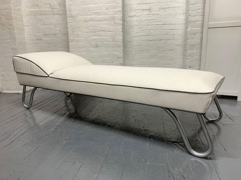 KEM Weber Daybed: Daybed upholstered in an embossed vinyl with black trim. Have tubular chrome legs. Mid-Century Modern. Measures: 22.5H x 74W x 26D.