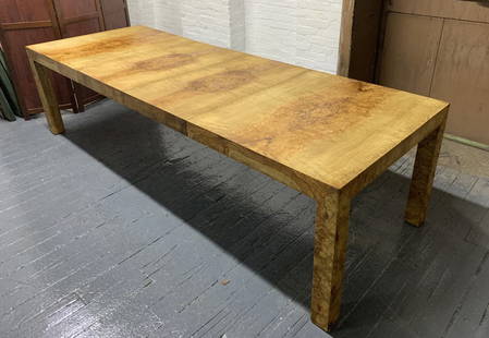Milo Baughman Dining Table: Burl wood with two extension leaves. Measures (with leaves): 110"W x 39" D x 29" H. Without leaves 66" W. Each leaf is 22"W.