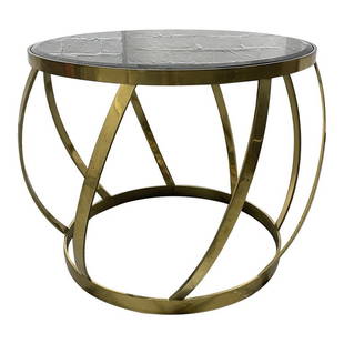 Karl Springer Side Table: Brass and Onyx Top Side Table. Heavy brass table with an onyx beveled insert top. Measures: 21H x 27.5 in diameter (at its widest).