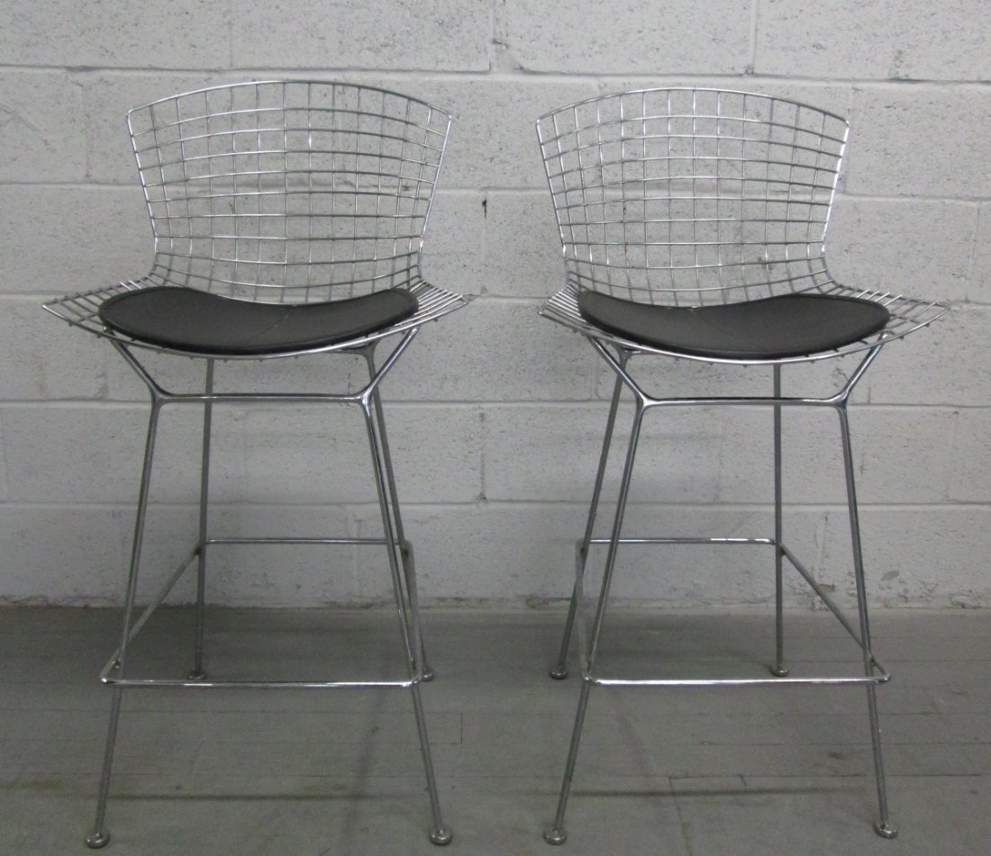 Pair Bertoia for Knoll Wire Stools: Black padded seats with wire chrome frames. Measures: 21.5"W x 40"H x 19.25"D.