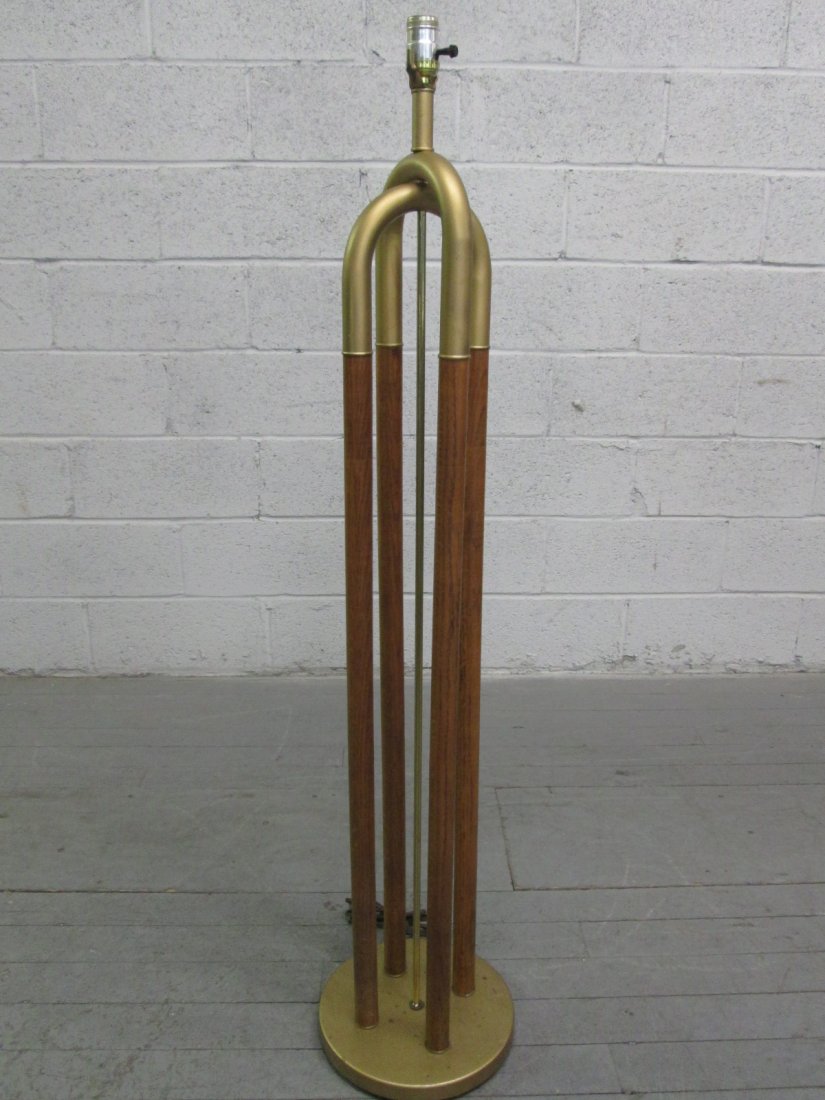 Mid Century Modern Floor Lamp: Oak floor lamp with gold metal top. Measures: 7"W x48"H (to under bulb socket0.