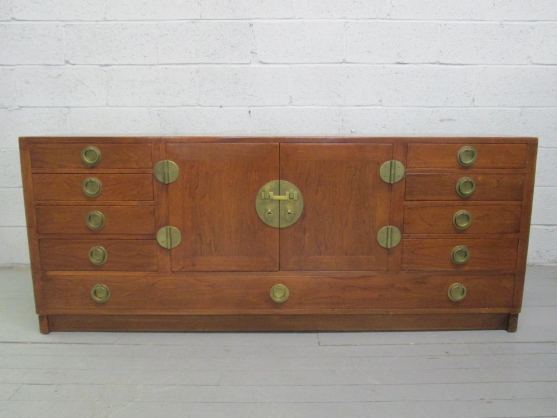 Edward Wormley Dunbar Credenza: Original brass hardware. Plenty of storage space. Has a pull out serving tray. Measures: 18"D x 69"W x 28.25"D