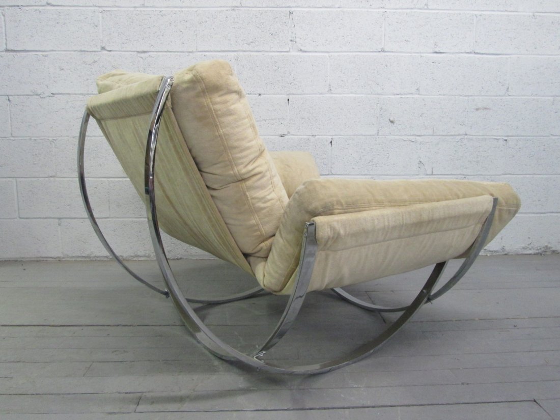Milo Baughman Style Chrome Chair: Large sculpted chrome and upholstered chair. Measures: 43"W x 43"D x 33"H (to top of back cushion).