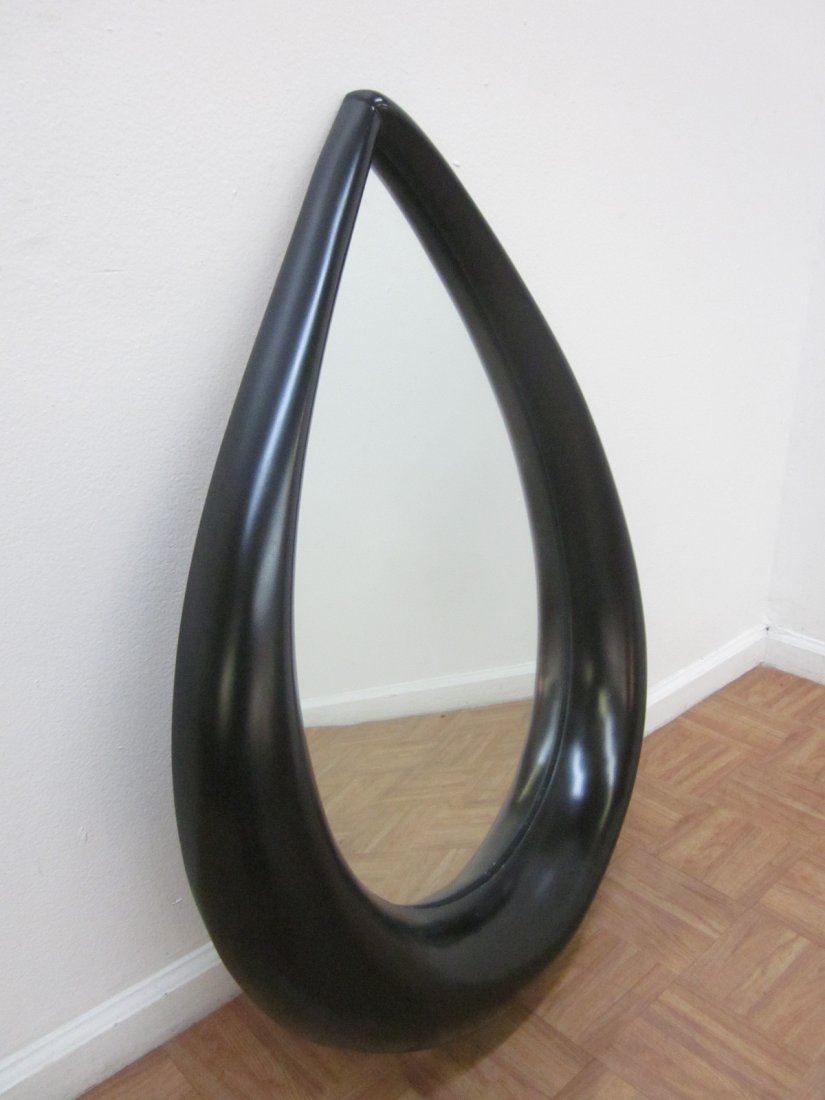 Black Tear Drop Shaped Mirror: Black painted frame. Measures: 27"W x 35"H