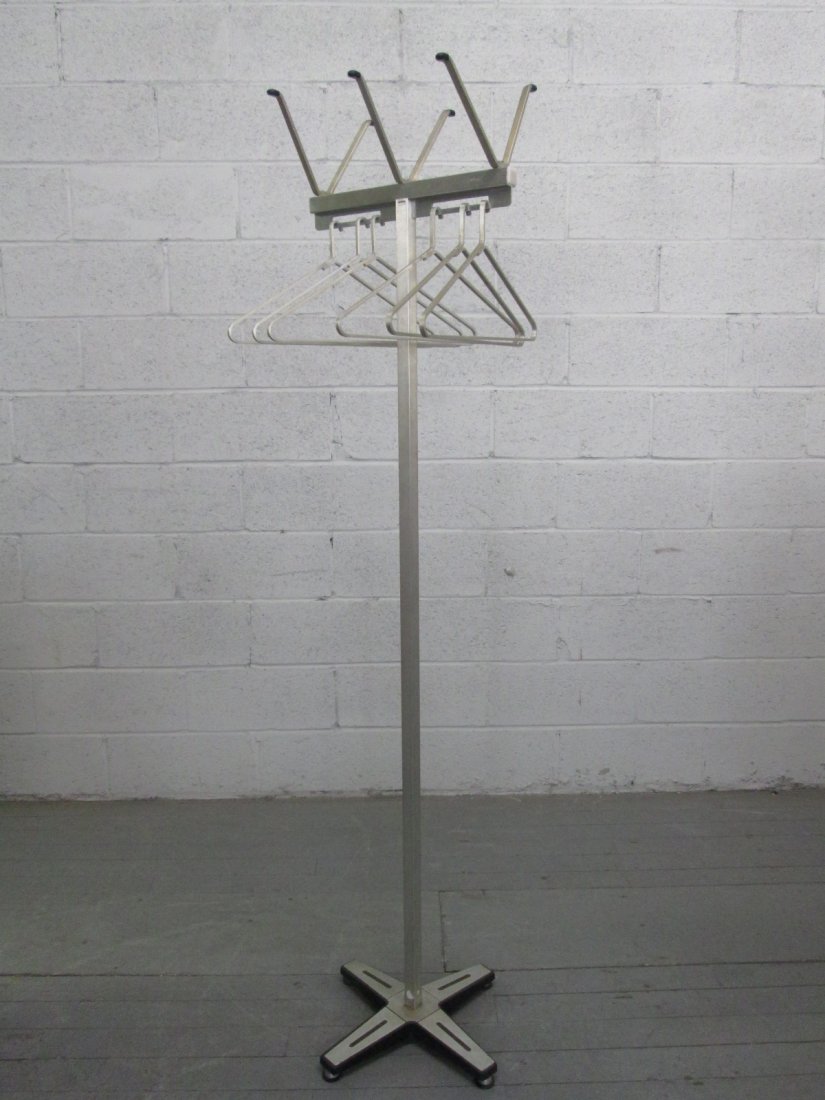 Unique Coat Rack w/ Hand Made Hangers: Aluminum coat and hat rack. Measures: 68.5"H