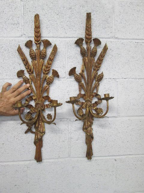 Pair Italian Antique Gold Gilt Wall Sconces: Wood sconces with gold gilt finish. Measures: 28"H x 9.5"W Sconces are not electrified.