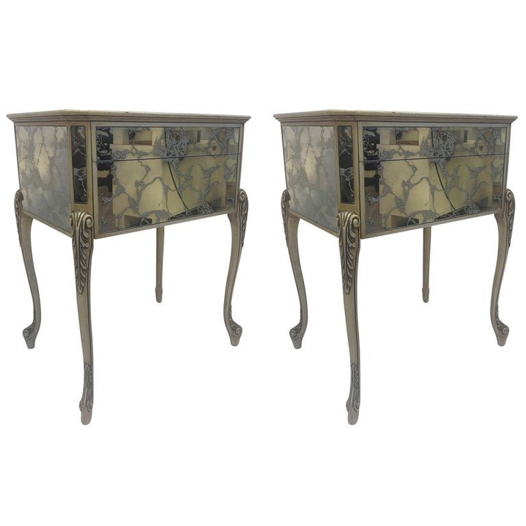 Églomisé Nightstands Pair: The nightstands also have a finished églomisé back with solid painted wooden legs. Drawer opens from the underneath. Measures: 28H x 22W x 16.25D.