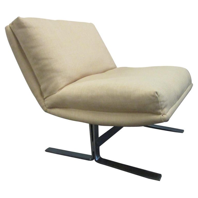 Modern Chrome and Upholstered Lounge Chair: Measures: 28.5H x 27W x 30D.