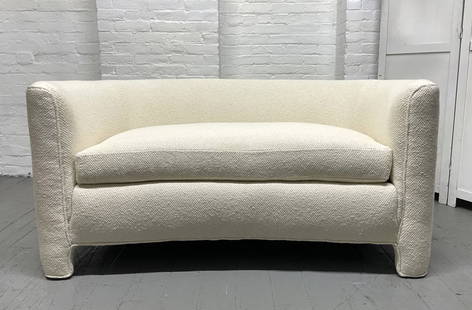 Loveseat in Boucle Fabric Mid Century Modern: Curved loveseat upholstered in Boucle. Measures: 26H x 57W x 32D. Seat height: 17.