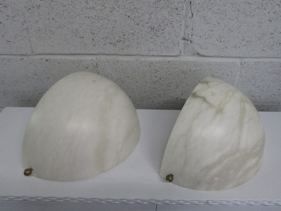Pair Alabaster Sconces: Pair Lightolier alabaster sconces. Slight scratches and will need to be rewired. Measures: 13.5"W x 7.25"
