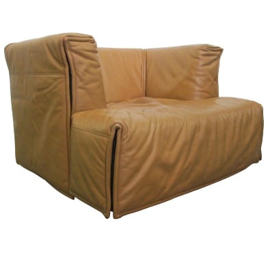 Italian Leather Lounge Chair: Tan leather lounge chair. Measures: 27H x 39.5W x 35D
