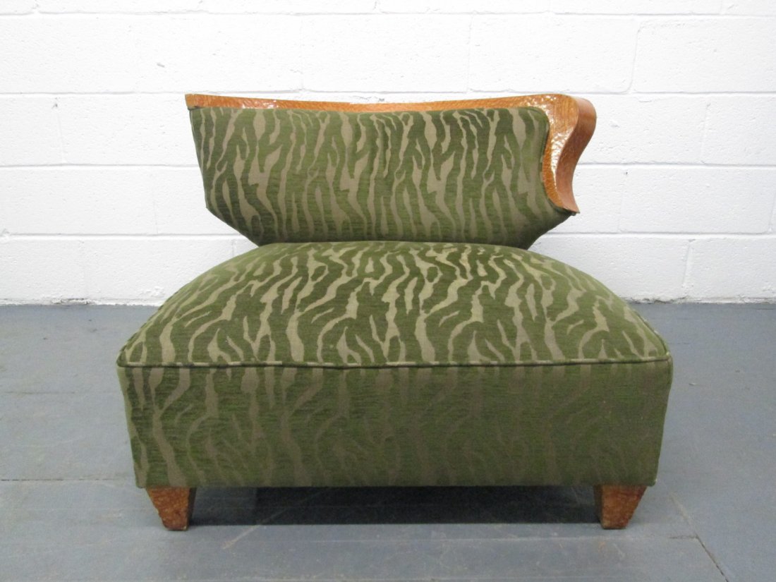 Gilbert Rohde Style Slipper Chair: Slipper Chair manner of Gilbert Rohde with burl wood trim and legs.Measures: 34"W x 34"D x 25"H.