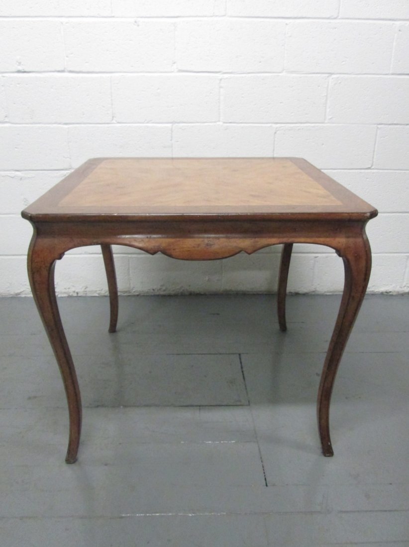 French Antique Style Dining Table: French Antique Style Dining Table. Table has a wonderful decorative style with cabriole legs. Measures: 29.5"H x 32"W x 32"D.The chairs posted in this description is to give you an idea and are listed