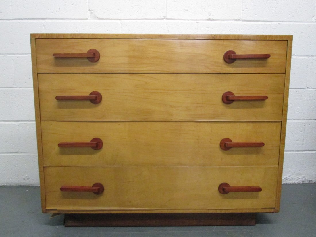 Gilbert Rohde Style Dresser: Dresser style of Gilbert Rohde having four pull out drawers. Measures: 42.5"W x 18"D x 34.25"H.