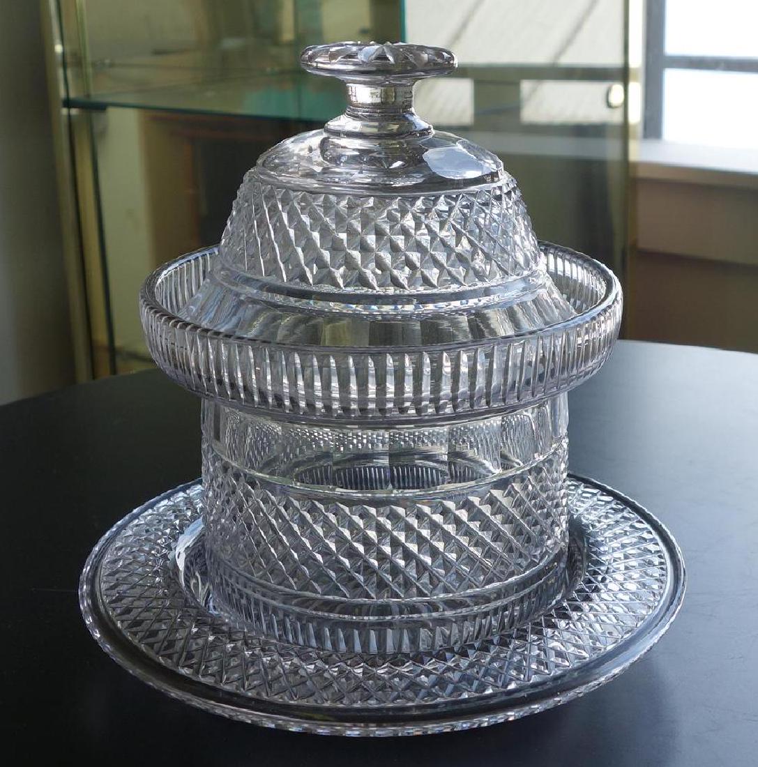 Fine 19thc English Cut Glass Urn & Stand: A fine English cut glass lidded urn / bonbon jar and matching stand / under-plate, 19th century. Measurement on stand, 7" high to top of floral formed finial, 5.25" diameter. The stand measures 7" dia