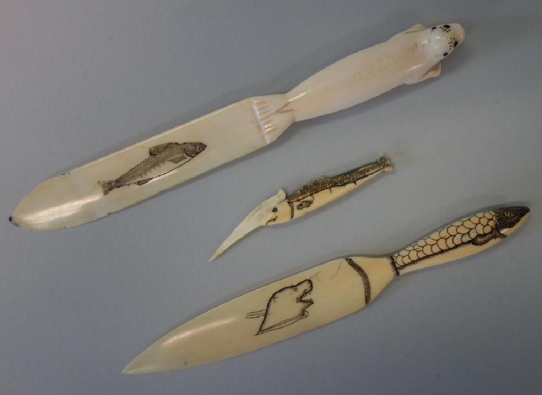 Inuit Eskimo Alaska Scrimshaw Letter Openers & Pic: Three Inuit Eskimo Alaskan / Canadian scrimshaw carvings. Comprised of two paddle type letter openers, 7" and 7.5" long. Together with a small fish formed knife / pic, 2.25" long.